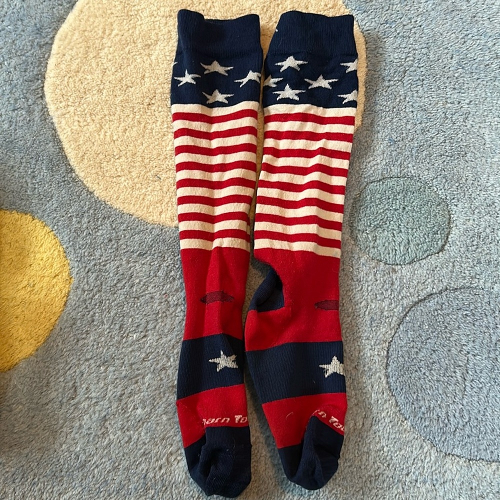 Darn tough no-cushioning ski socks, youth size medium.
